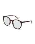 A pair of eyeglasses with round clear lenses and a brown Schildpattmuster frame, slightly curved arms, and a subtle Okkia logo on the left temple, designed for comfortable wear, displayed against a white background.