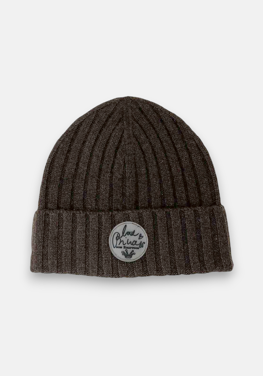 A dark gray ribbed knit beanie by Princess Goes Hollywood with a folded cuff. The cuff features a circular patch reading Love First in cursive, with a small heart and leafy branch, highlighting its geripptes Design.