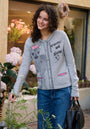 Strickjacke mit Reh-Motiv und Handstich-Details