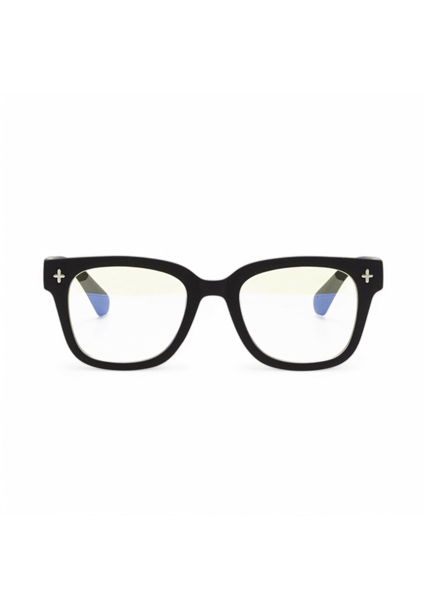 A pair of Okkia black, thick-rimmed rectangular Bildschirmbrille with clear lenses and small white plus signs on each corner. Black temples fade to blue at the tips, blending style and comfort. Photographed against a white background.