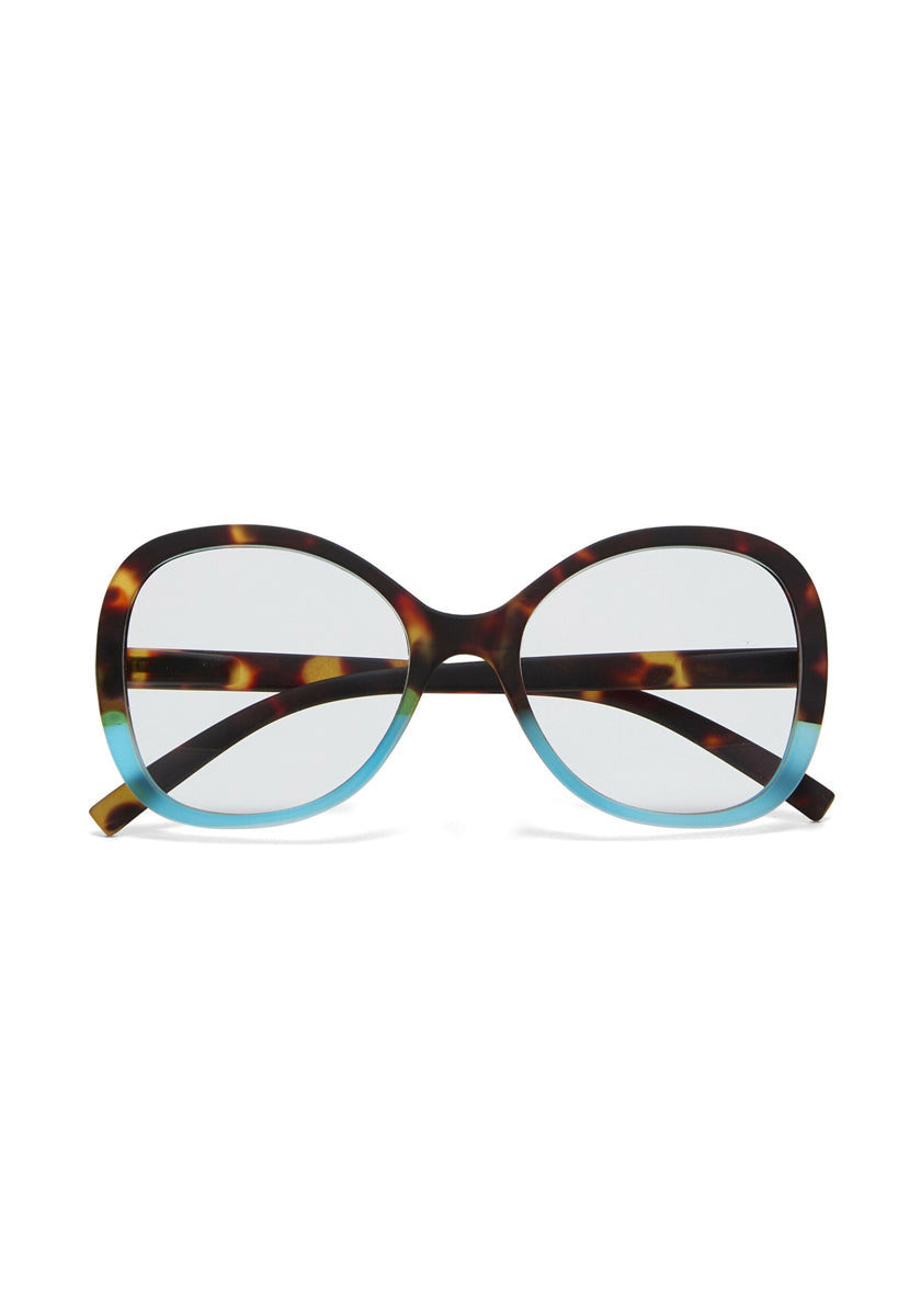 Front view of Okkia oversized Lesebrille with Soft-Touch finish, tortoiseshell upper frame and temples, light blue lower half. Features large rounded lenses, crossed temples, and a chic butterfly design.