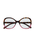 A pair of oversized Okkia Lesebrille with clear lenses. Rounded frames feature a brown tortoiseshell top and translucent pink bottom, matching tortoiseshell temples, and a stylish butterfly design for all-day comfort.