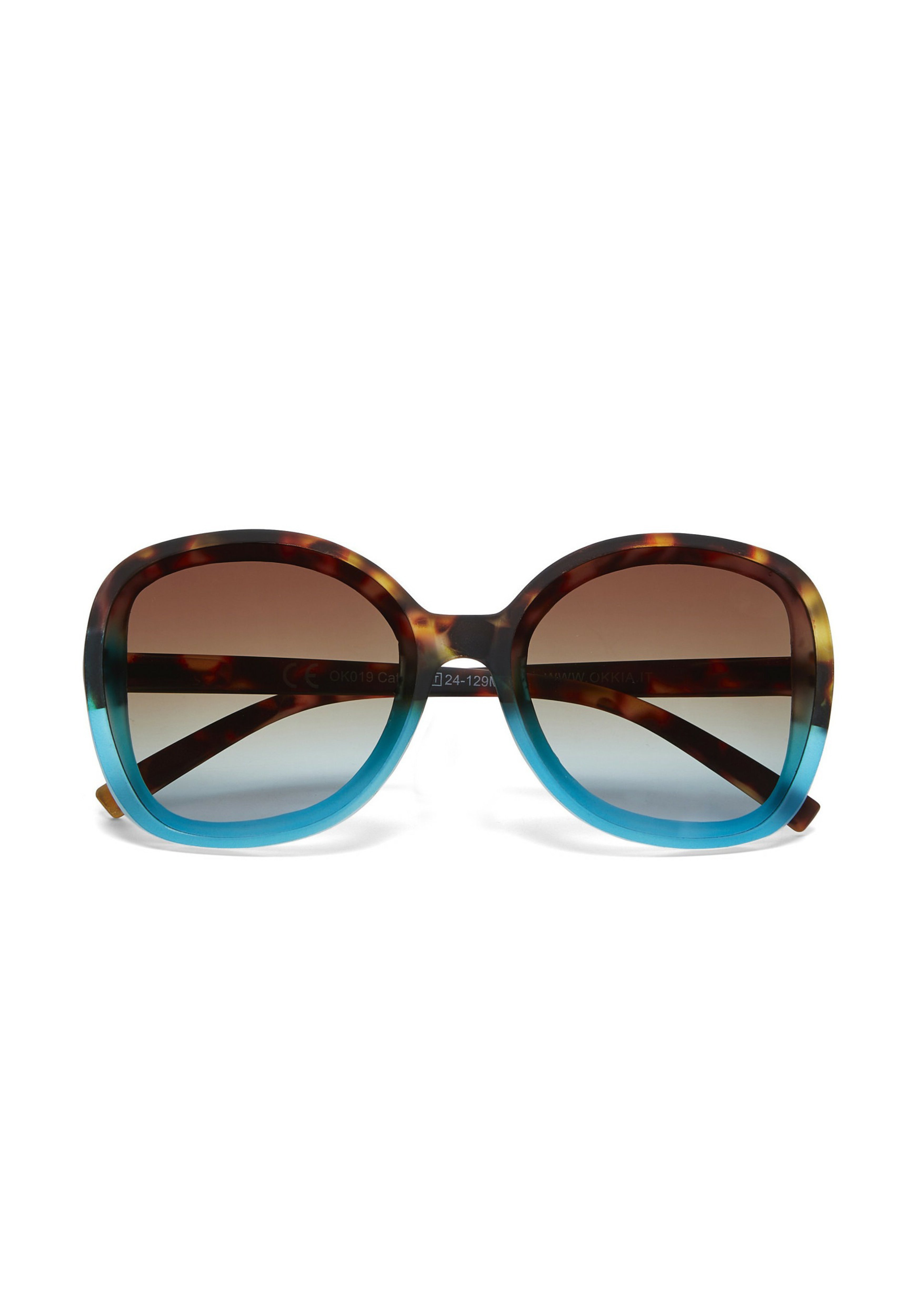 Okkia oversized sunglasses with rounded frames feature a brown tortoiseshell upper half and gradient blue lower half. Brown tinted lenses fade lighter at the bottom. Displayed against a white background.